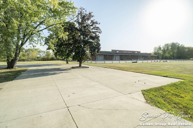 surrounding community featuring a lawn