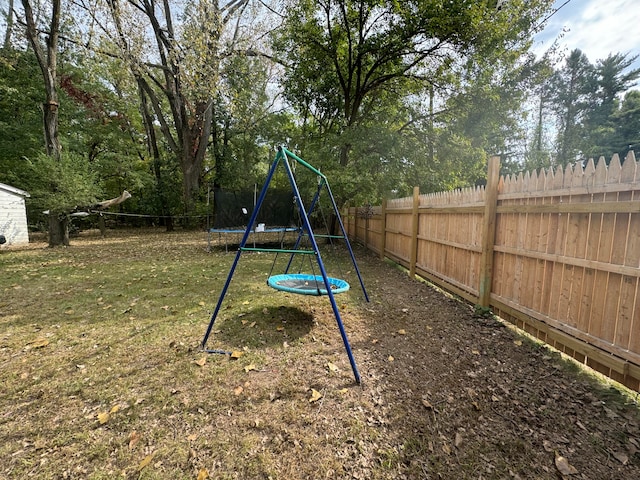 view of yard featuring a trampoline