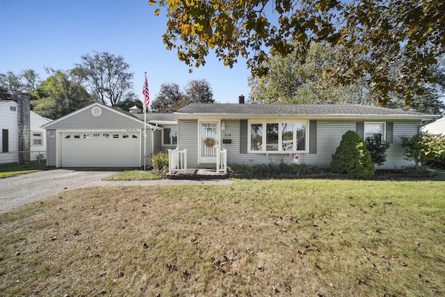 ranch-style house featuring a garage and a front yard