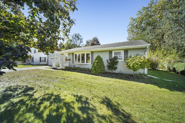 ranch-style home with a front lawn