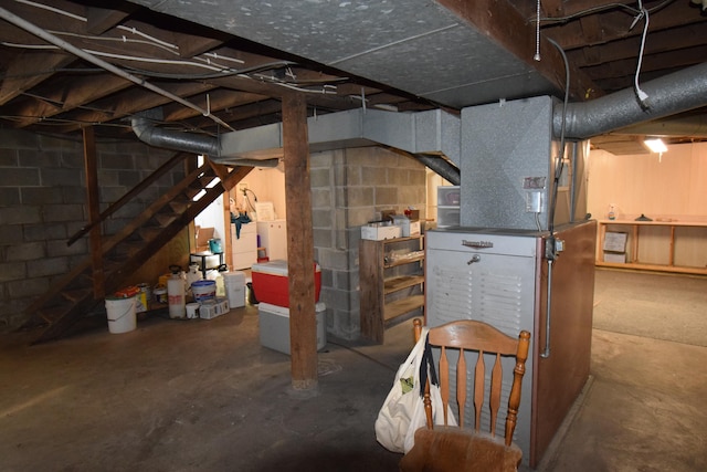 basement featuring heating unit