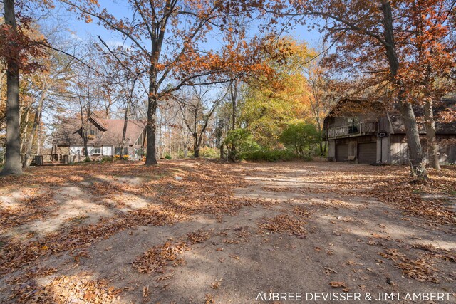 view of yard with a garage