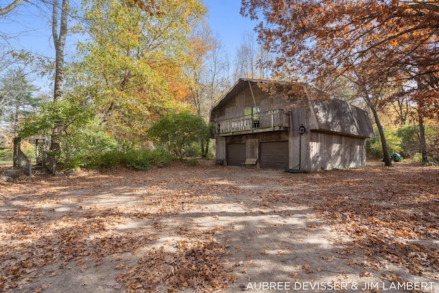 view of side of property featuring a garage