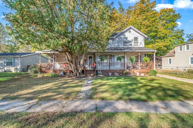 view of front of house featuring covered porch and a front yard