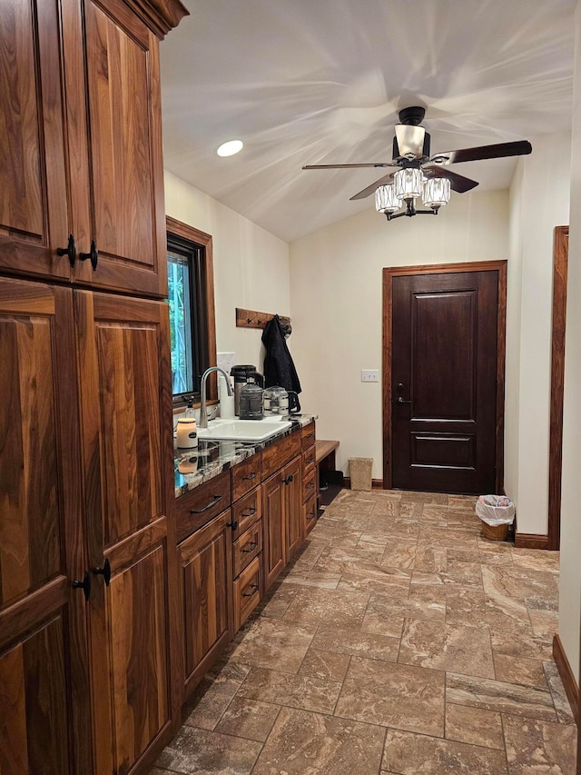 interior space featuring sink and ceiling fan