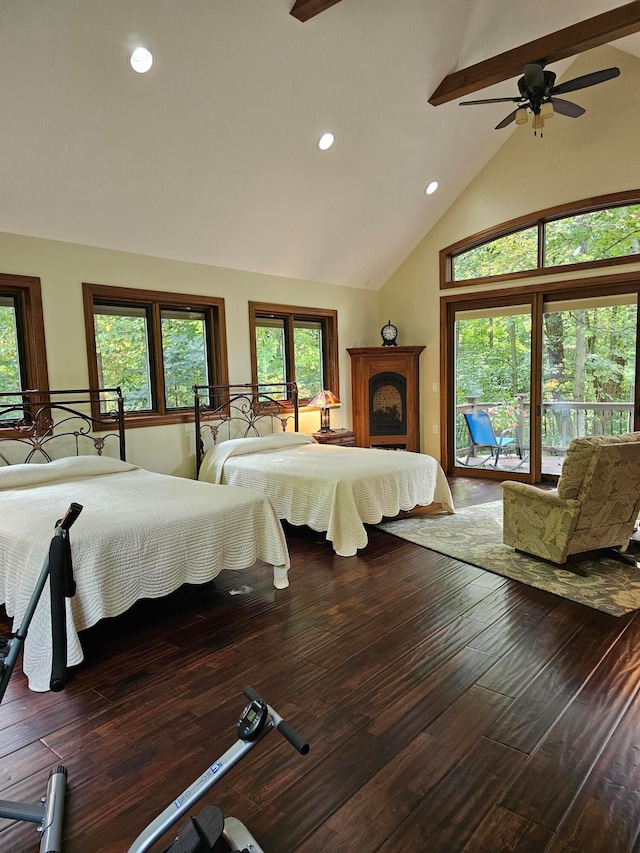 bedroom with ceiling fan, dark hardwood / wood-style floors, access to outside, and high vaulted ceiling