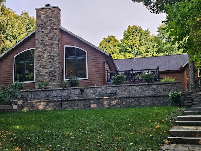 view of home's exterior featuring a yard