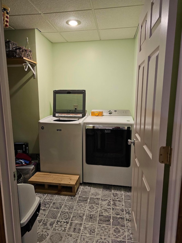 washroom with washer and dryer