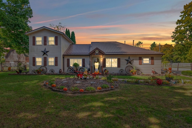 view of front of house featuring a yard