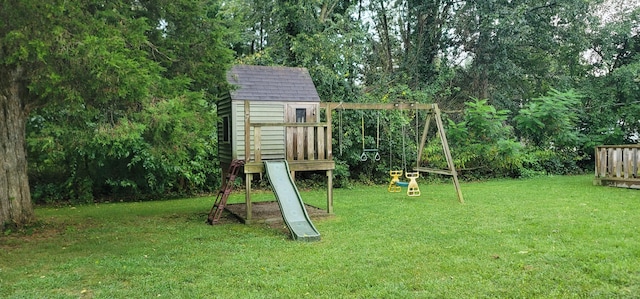 view of jungle gym with a lawn