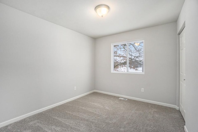 unfurnished room with carpet