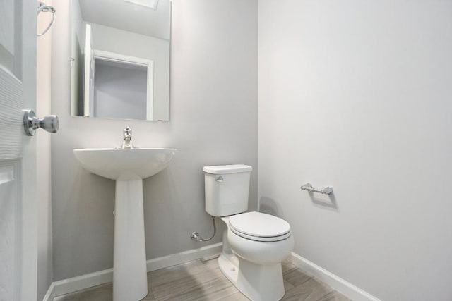 bathroom featuring toilet