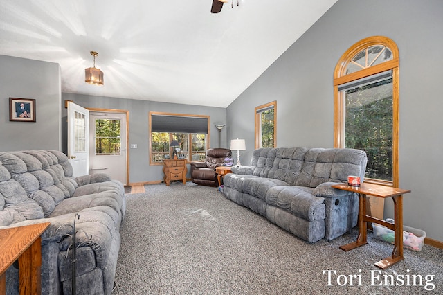 living room featuring carpet floors, high vaulted ceiling, and ceiling fan