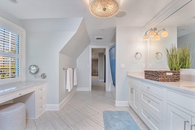 bathroom featuring shower / bath combination with curtain, vanity, and lofted ceiling