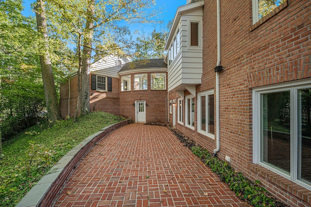 view of home's exterior with a patio area