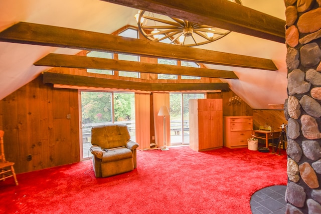 sitting room with vaulted ceiling with beams, carpet floors, and wood walls