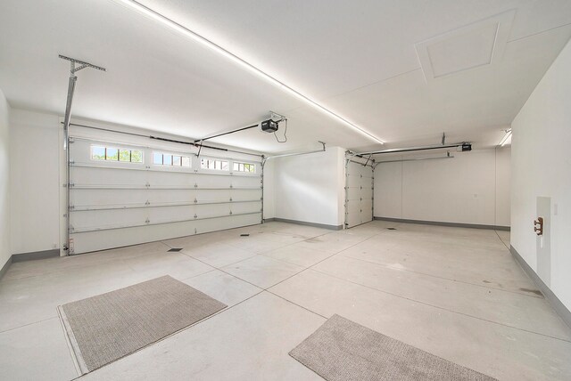 garage featuring a garage door opener