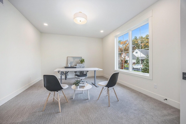 carpeted office featuring recessed lighting and baseboards