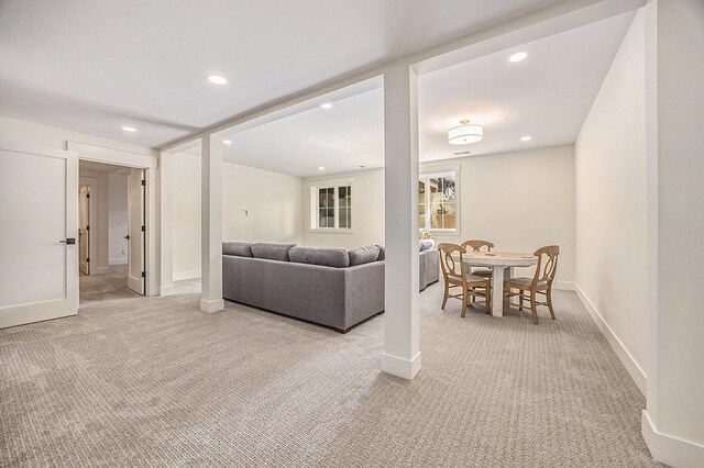 living room featuring light colored carpet