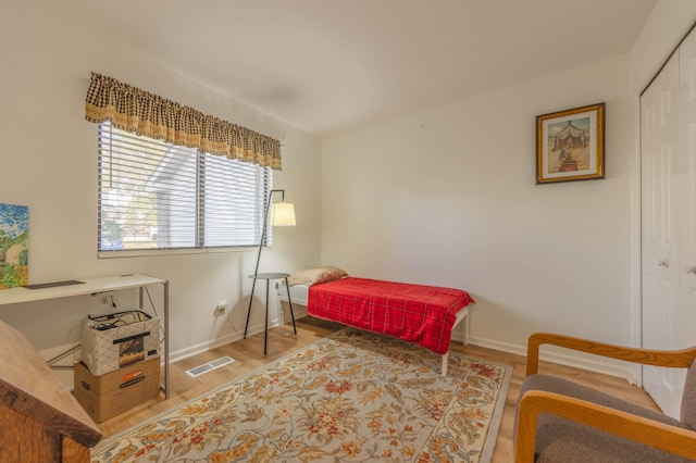 bedroom featuring hardwood / wood-style flooring