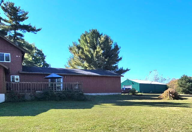 view of yard featuring a wooden deck