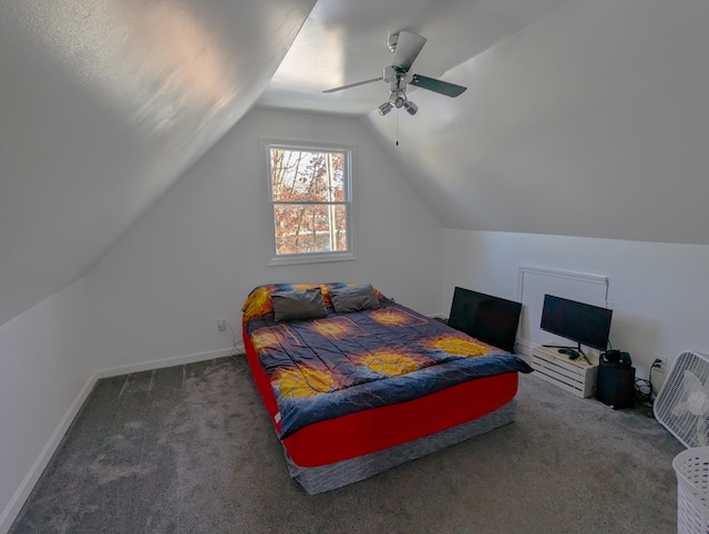 carpeted bedroom featuring vaulted ceiling and ceiling fan