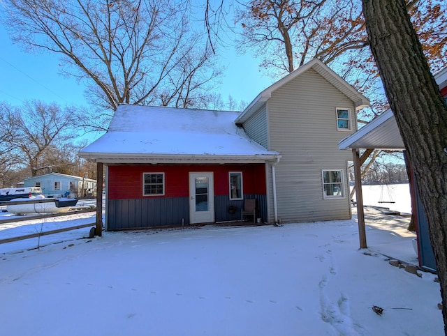 view of snow covered house