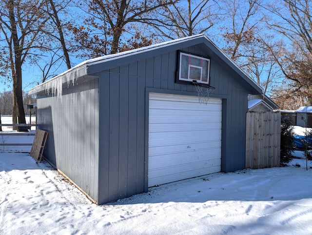 view of snow covered garage