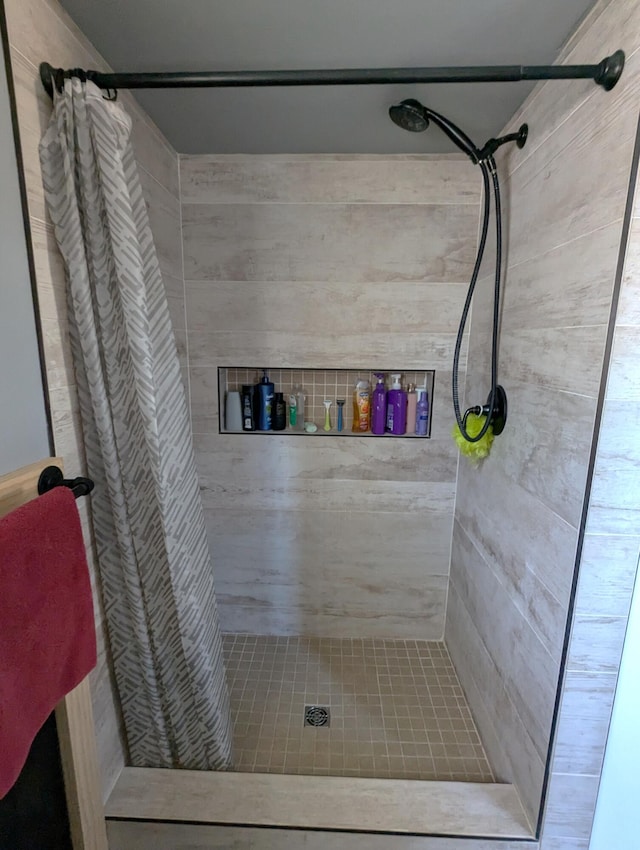 bathroom with a shower with shower curtain