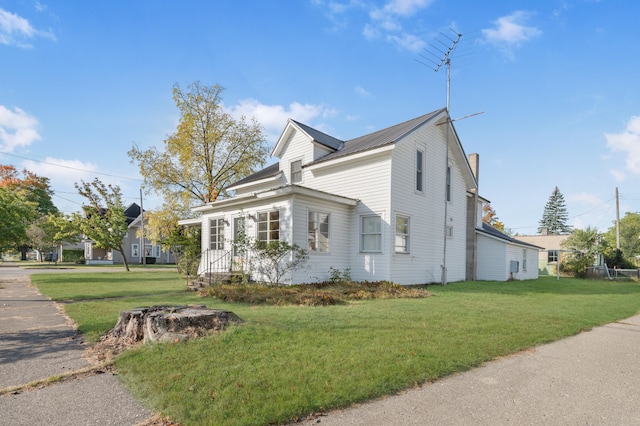 view of property exterior featuring a yard