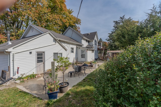 rear view of property with a patio area