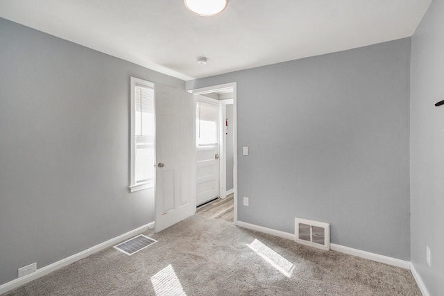 view of carpeted spare room