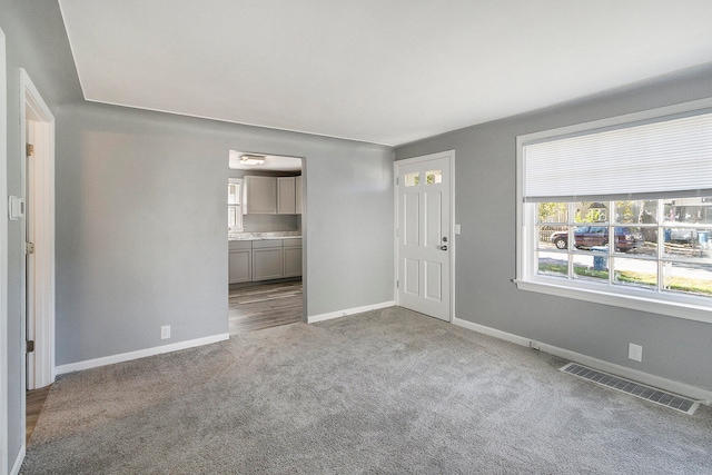 view of carpeted spare room