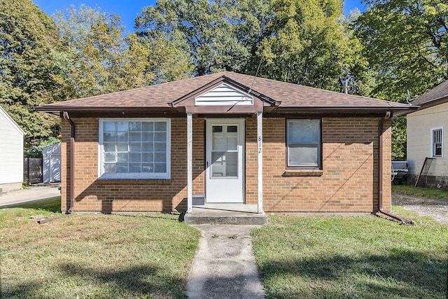 bungalow with a front lawn