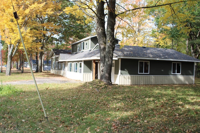 exterior space with a yard