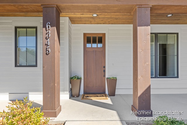 entrance to property with covered porch