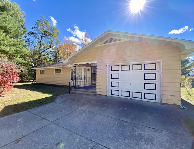 view of front of home with a garage