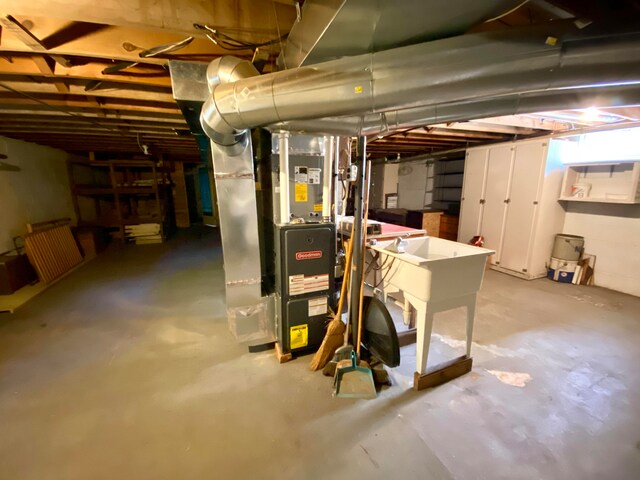 basement featuring heating unit