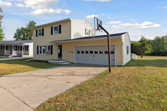 view of front of property featuring a front yard and a garage