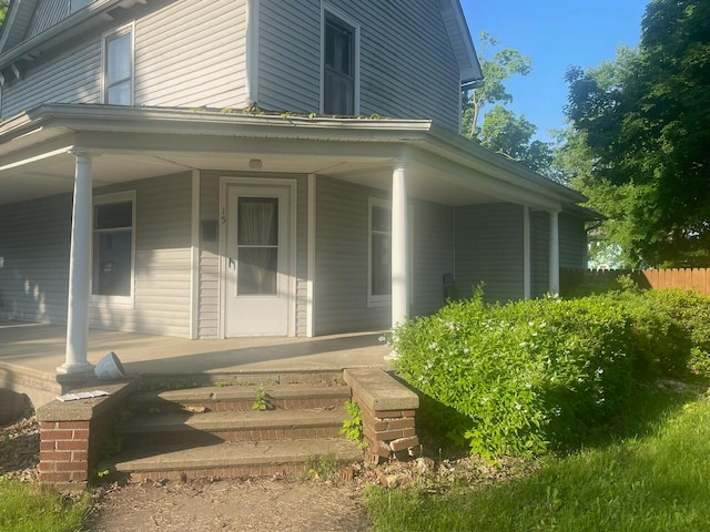 doorway to property with covered porch