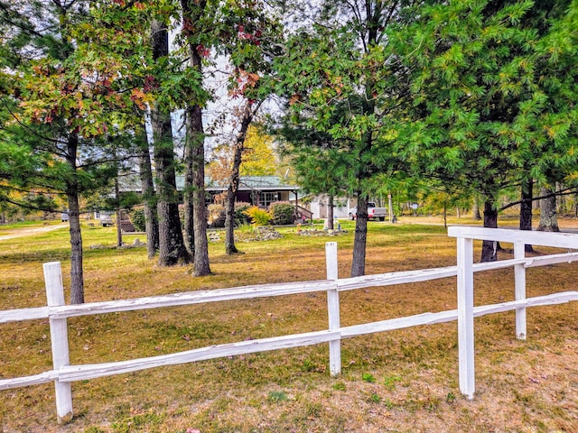 view of yard with a rural view