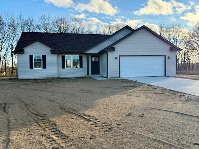 single story home with a garage