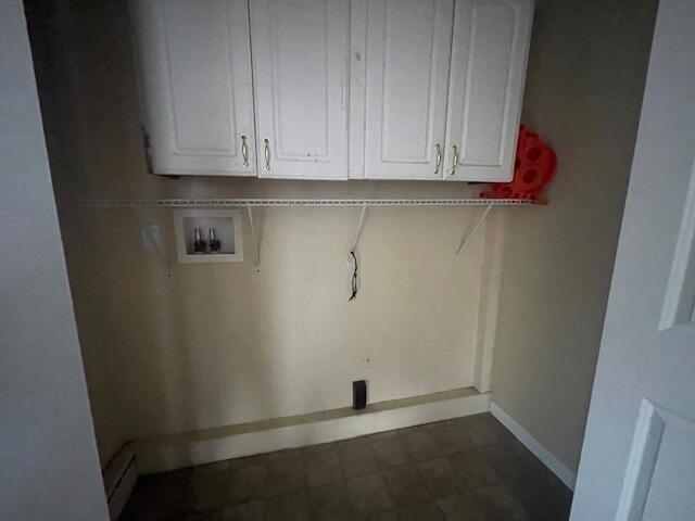 laundry room with cabinets and hookup for a washing machine