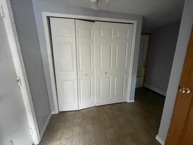 unfurnished bedroom featuring a closet