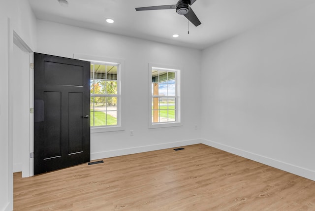 entryway with light hardwood / wood-style flooring and ceiling fan