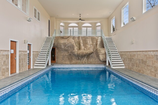 view of pool featuring ceiling fan