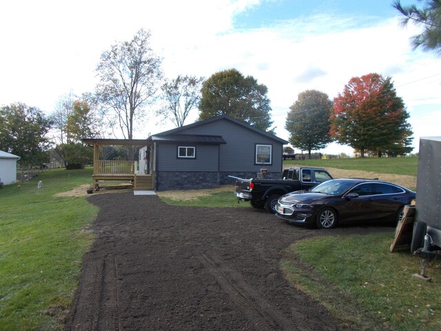 view of home's exterior featuring a yard