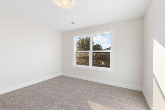 spare room with carpet flooring