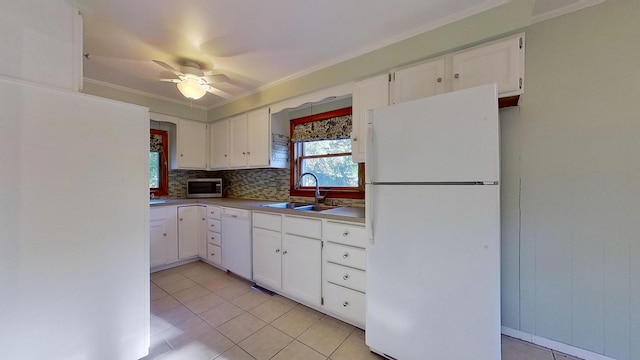 kitchen with white cabinets, ceiling fan, light tile patterned floors, and white appliances