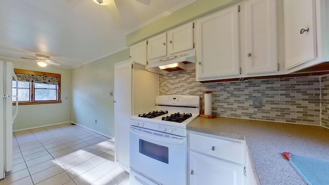 kitchen featuring decorative backsplash, white cabinets, ceiling fan, light tile patterned floors, and white appliances